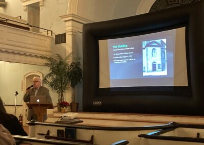 image of a lecture in the sanctuary on its history